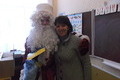 Вчителі радо зустрічають дідуся Мороза